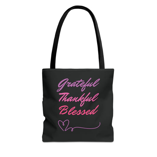 black tote bag with the words "Grateful", "Thankful", and "Blessed" printed in pink and purple with a heart symbol