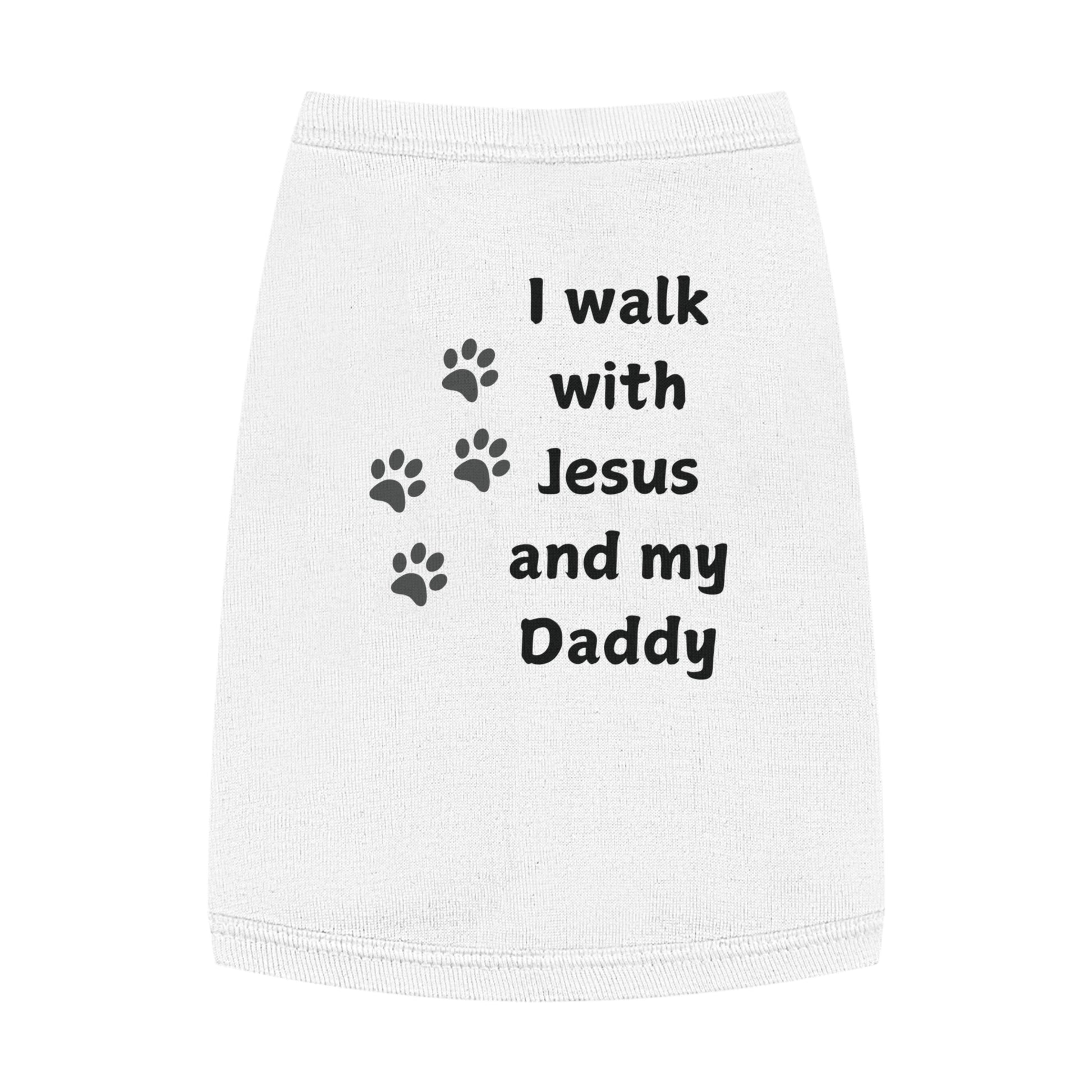 Dog t-shirt with the text 'I walk with Jesus and my Daddy' and paw prints