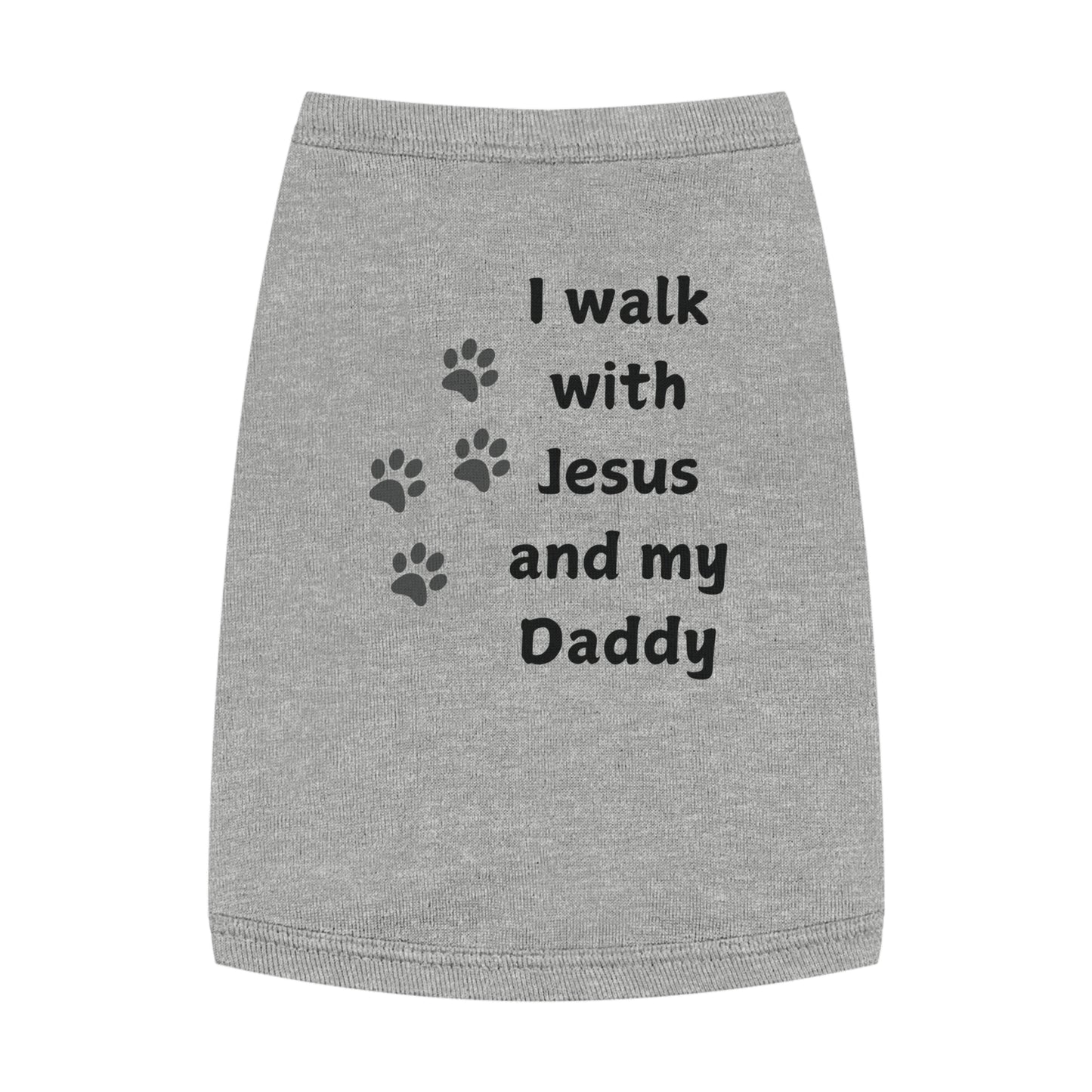 A gray dog t-shirt with the phrase "I walk with Jesus and my Daddy" printed in black, along with three paw prints.