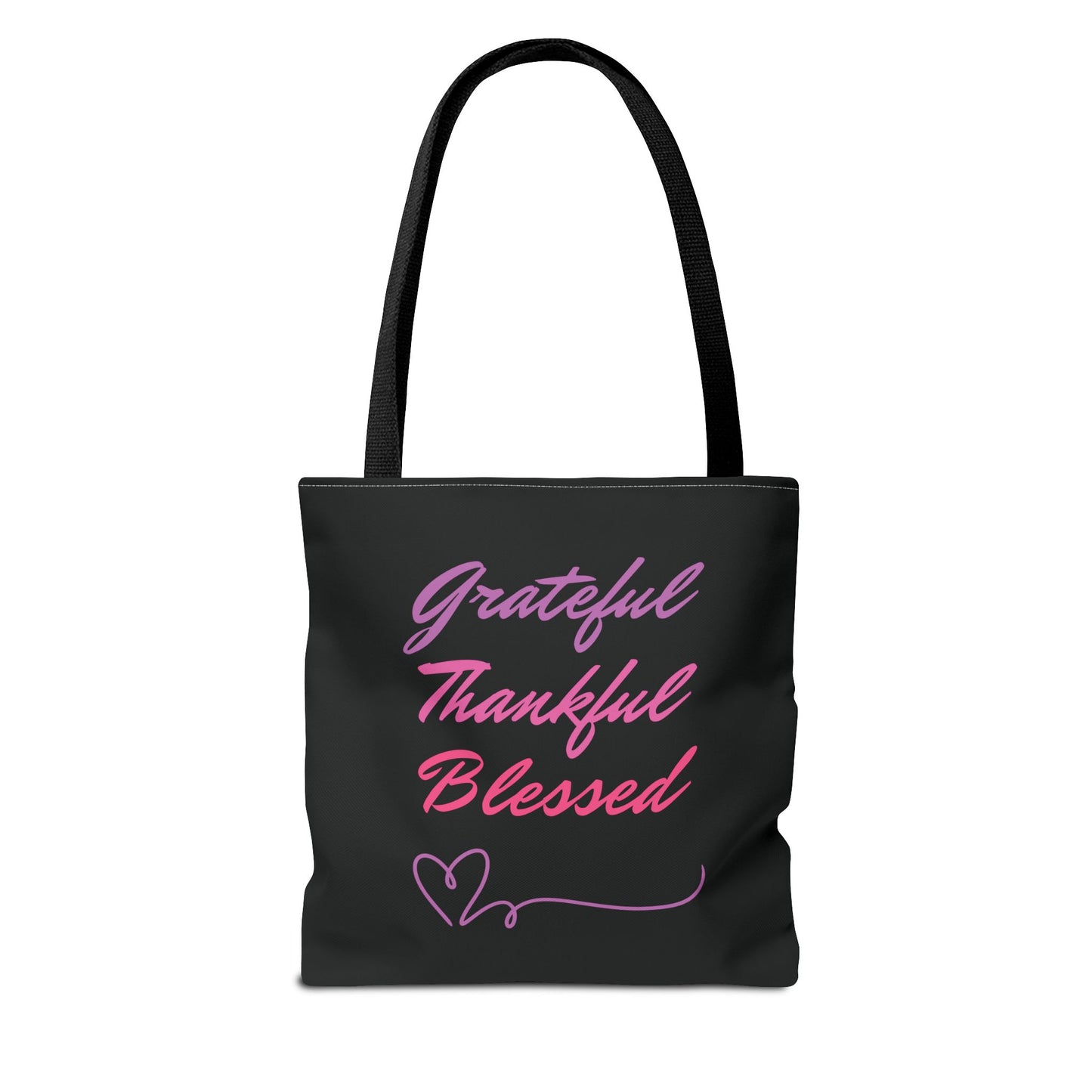 A black bag with red text that says "grateful thankful blessed" and black straps.